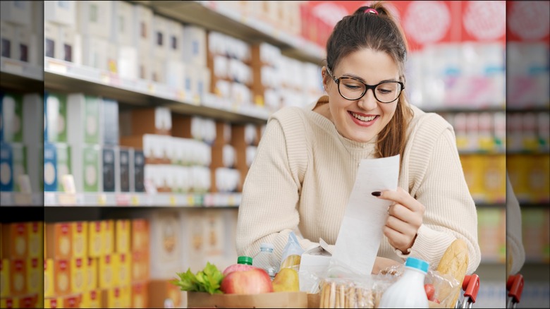 woman happy cheap reciept