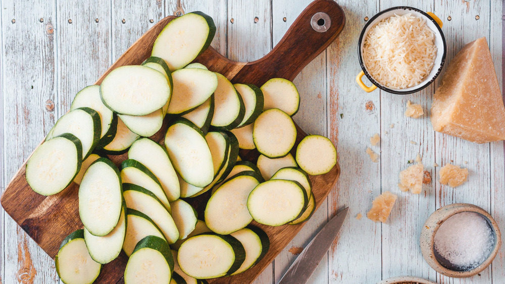 sliced zucchini on cutting board