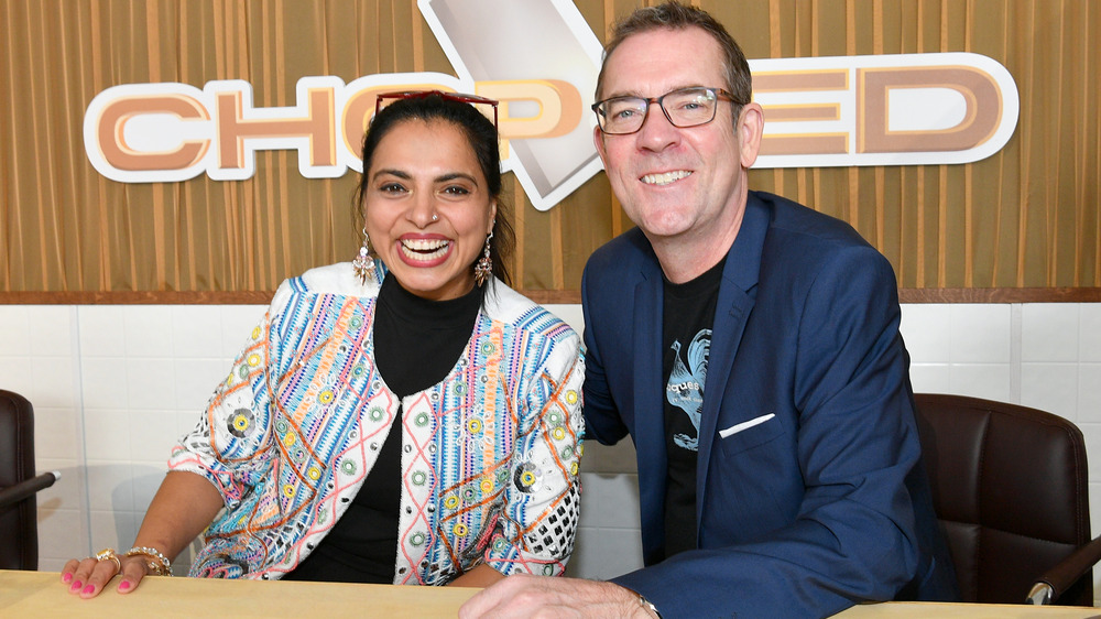 Ted Allen and Maneet Chauhan smiling