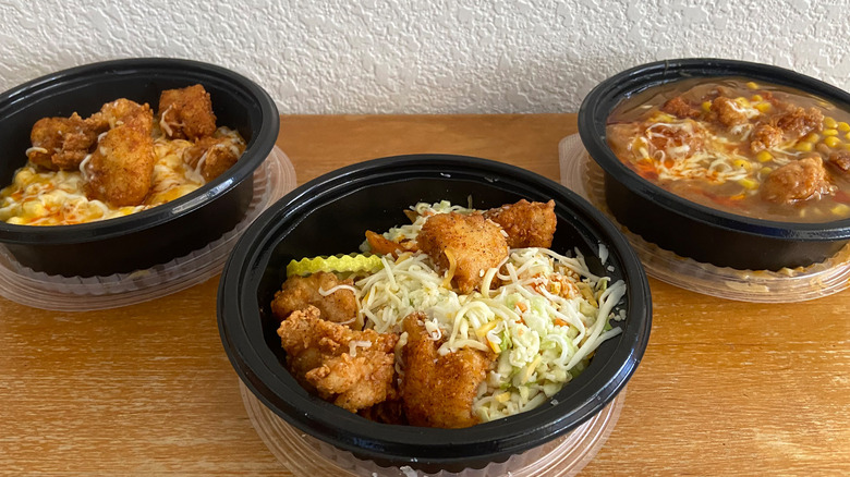 Three KFC bowls arranged together