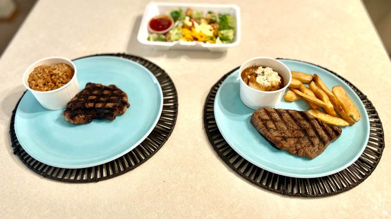 steaks with sides on counter