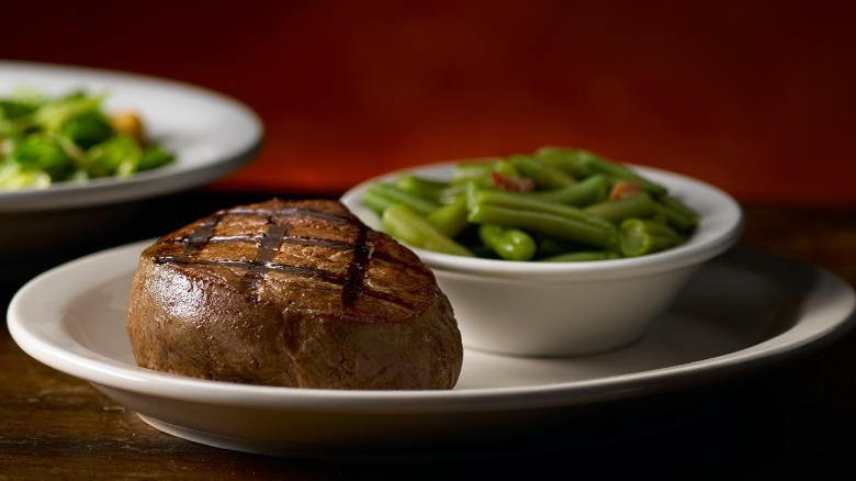 Dallas Filet steak next to green beans