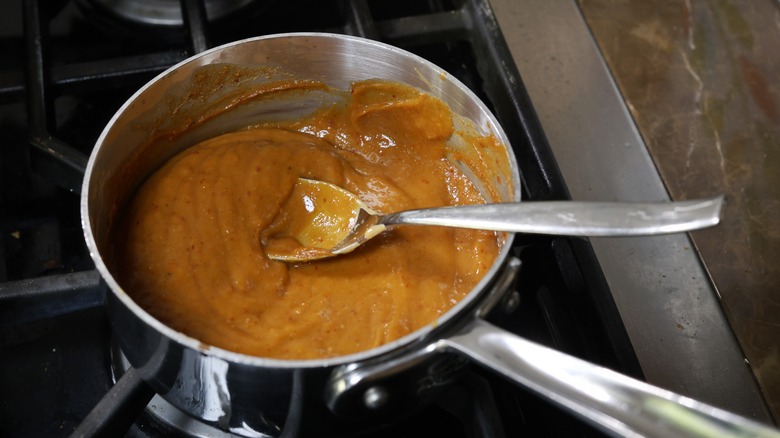 saucepan of peanut sauce