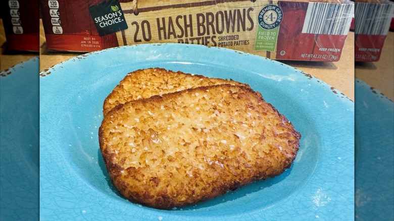 hash brown patties on a blue plate