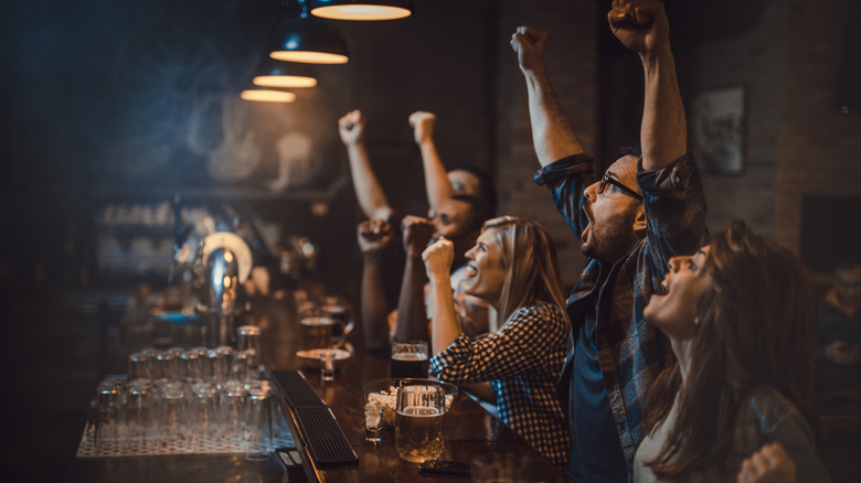 Sports bar crowd cheering