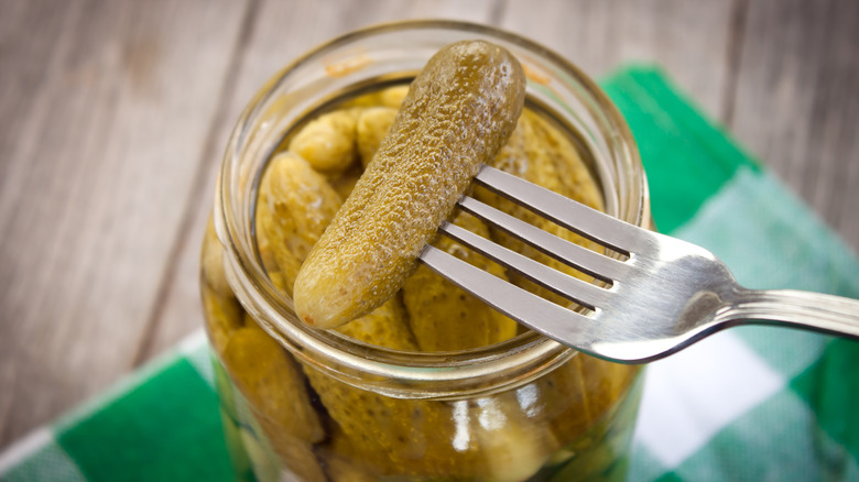 small pickles on fork