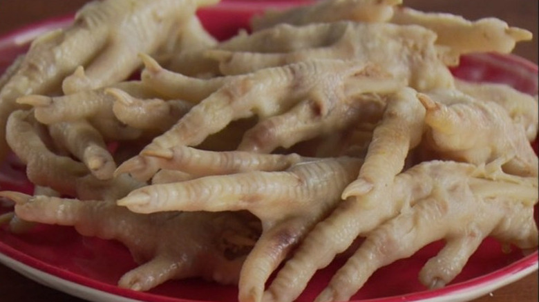 Plate of raw chicken feet