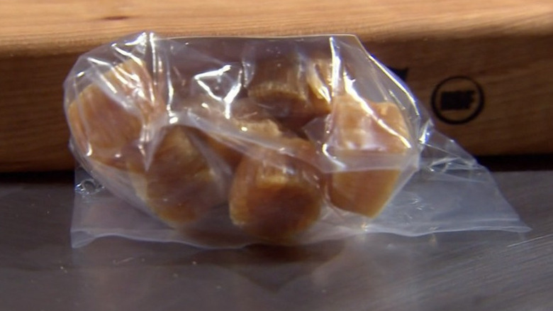 Bagged dried scallops on counter