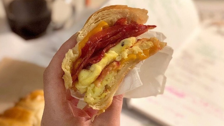 Handheld croissant sandwich from Corner Bakery