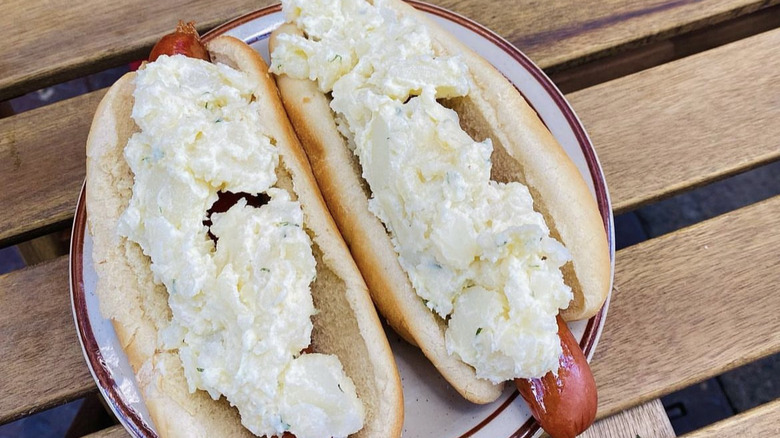 Two potato salad hot dogs