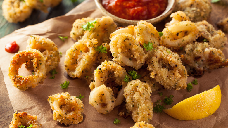 Fried calamari with a dish of ketchup