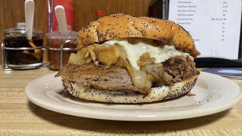 A cheesesteak from Donkey's Place sits on a white plate