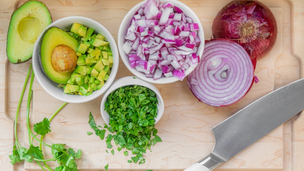 cutting vegetables for 20-minute chicken tacos