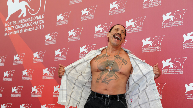 danny trejo showing chest tattoo