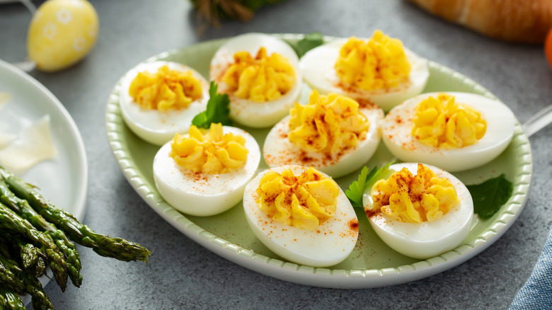 Deviled eggs with paprika and parsley