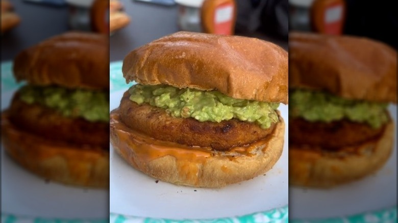 A salmon burger made using all ingredients from Aldi.