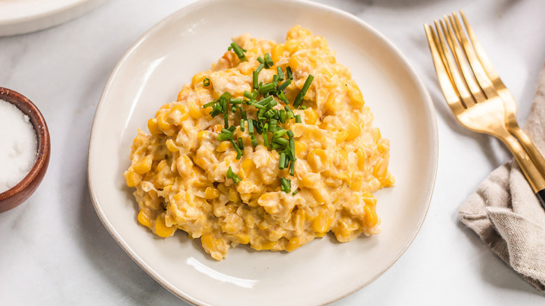 Creamed corn on white plate