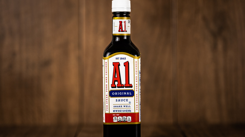 A1 Steak Sauce on wood background 