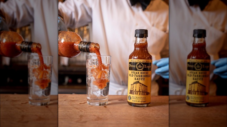 Bartender pouring steak sauce in glass