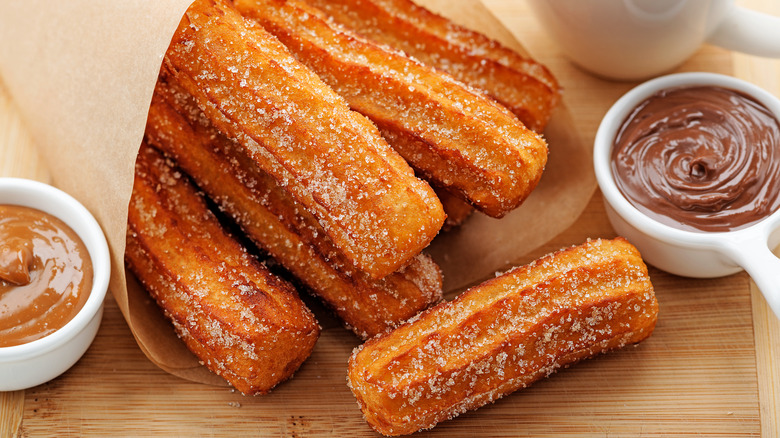 sugary churros with sauce