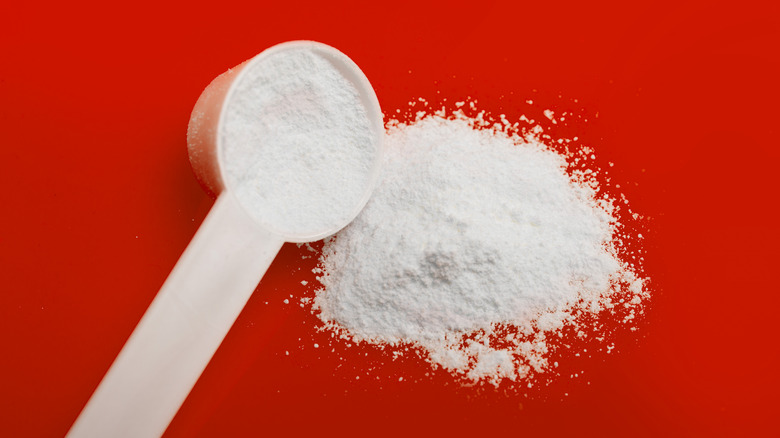 Dextrose white powder red background