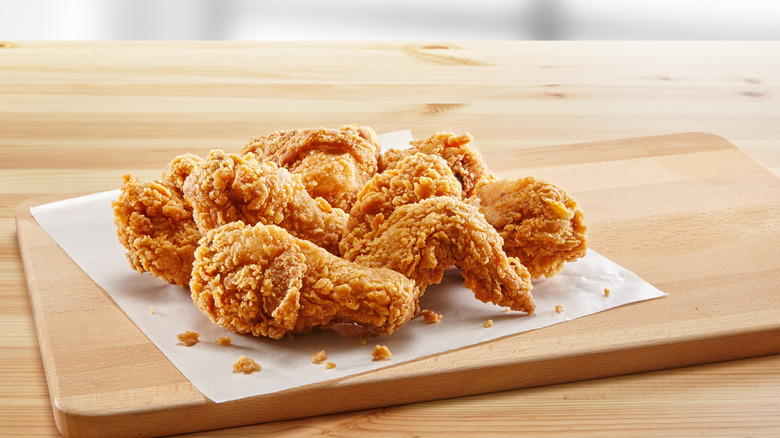 Fried chicken on wooden table