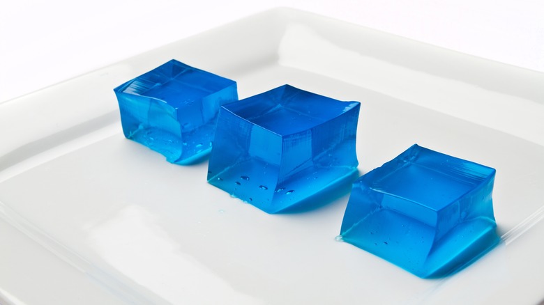 blue jello squares white plate