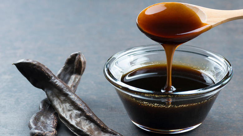 Molasses in bowl with spoon