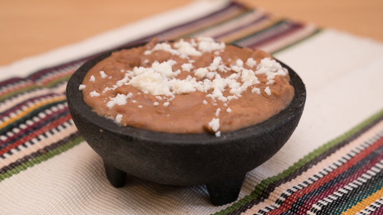 Refried beans with cheese