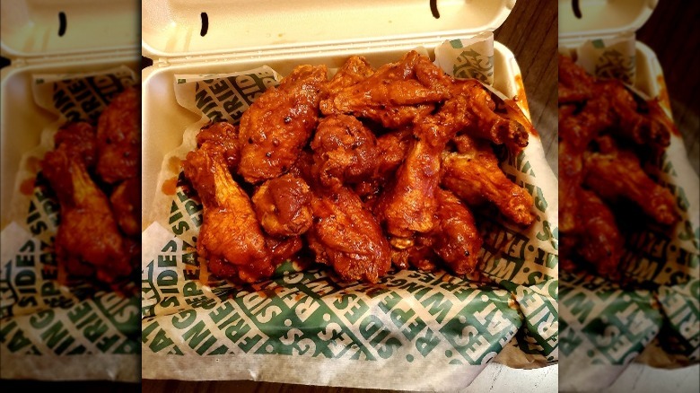 Wingstop Atomic Wings in styrofoam container