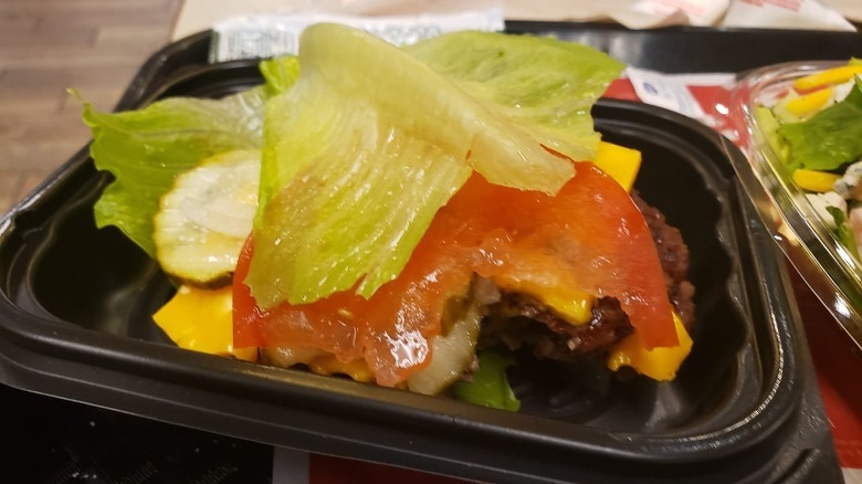 Wendy's Dave's Double with no bun in a black tray