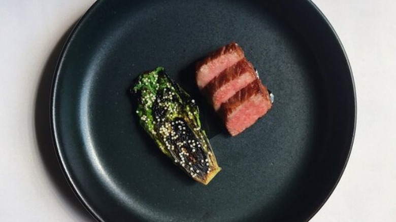 braised bok choy and sliced steak from Oriole