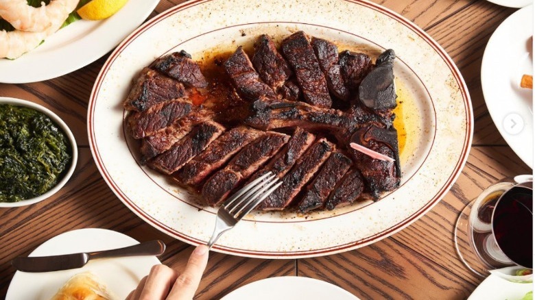 Steak for two with sides at Luger's