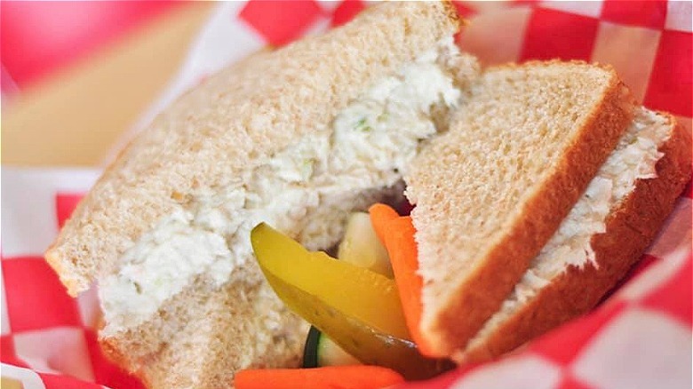 Chicken salad sandwich red background