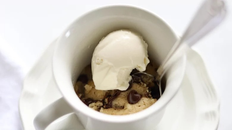 Chocolate Chip Cookie In A Mug with vanilla ice cream and spoon