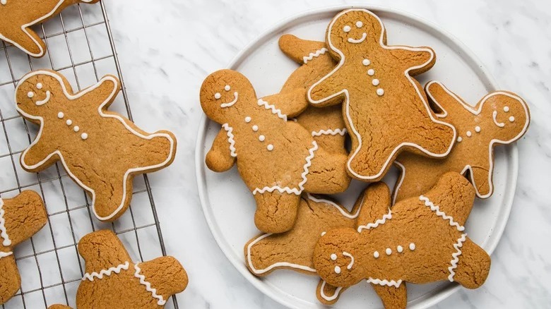 plate of decorated gluten-free gingerbread cookies