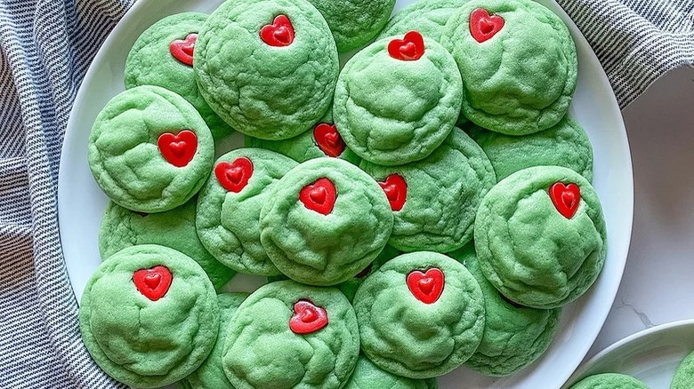 grinch cookies on plate with napkin