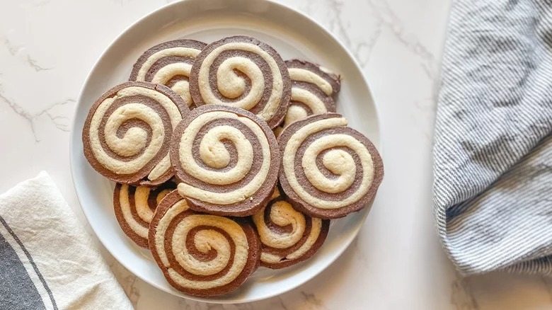 Old-Fashioned Pinwheel Cookies on plate with napkins