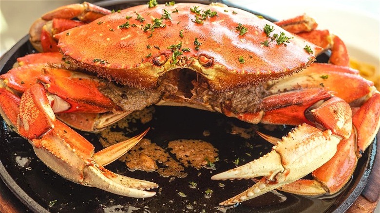 cooked crab on iron skillet