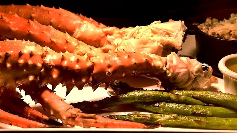 crab legs, asparagus, butter