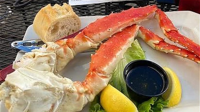 crab legs, butter, and sides