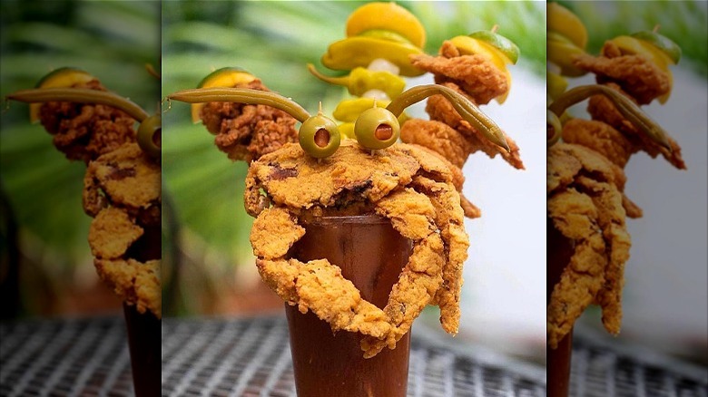 fried crab atop Bloody Mary 