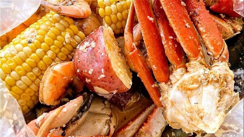 corn, potatoes, crab legs 