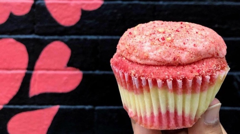 pink cupcake and wall art