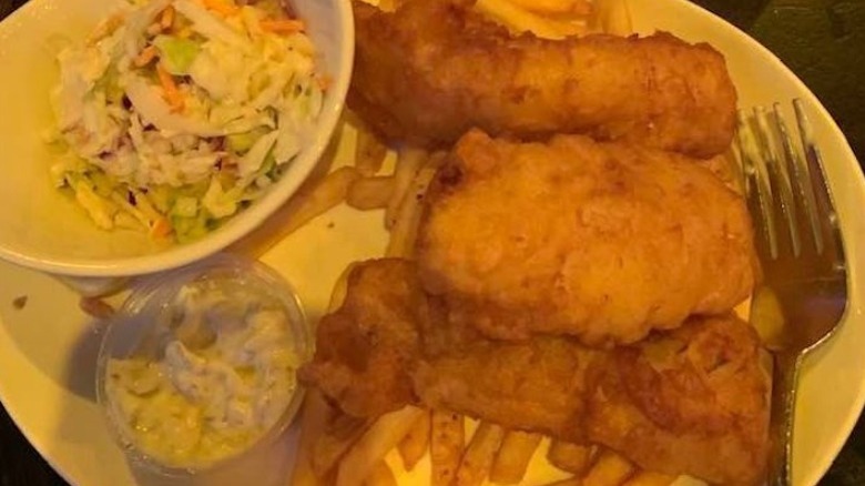 Fried fish with coleslaw and French fries