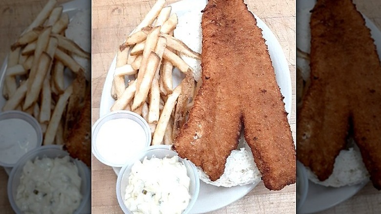 fried fish sandwich with fries