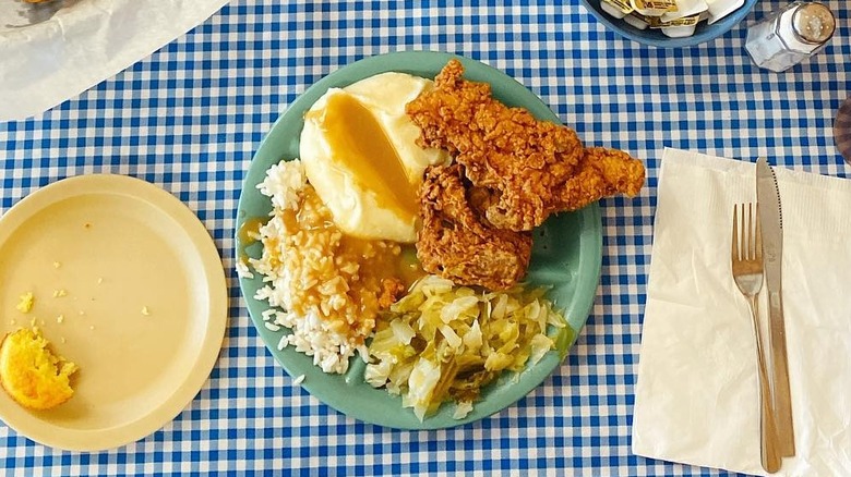 Fresh fried chicken on a blue gingham table cloth