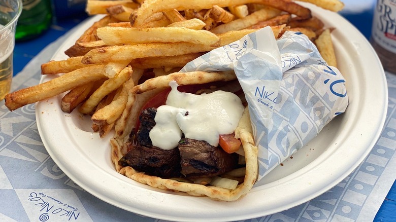 gyro and fries on plate