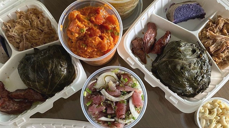 food spread of kalua pork lomi lomi salmon lau lau taro