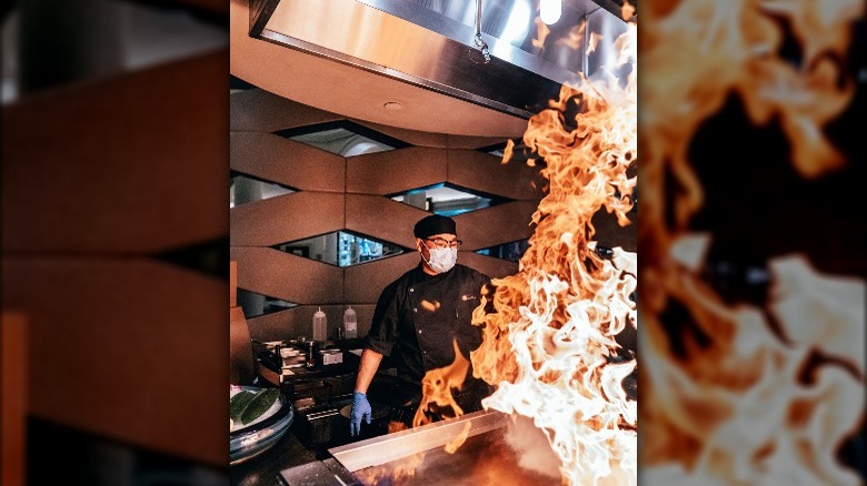 Chef at Nobu lights up the grill at Caears Place